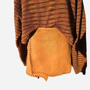 Haute Rogue brown suede mini skirt with slit and pockets. Size M